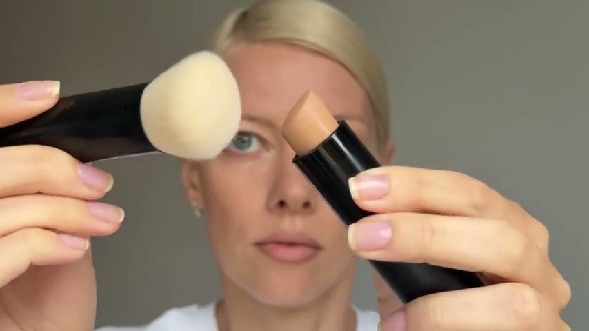 @elenarachitskaya reviewing Lancôme Teint Idole Ultra Wear Shape Stick at 06:09 in a YouTube Shorts video