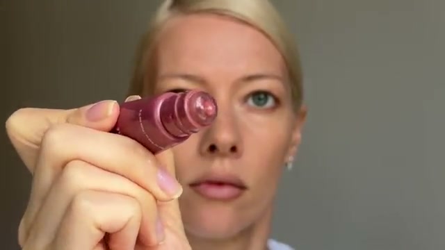 @elenarachitskaya reviewing Laneige Glaze Craze Tinted Lip Serum at 06:44 in a YouTube Shorts video