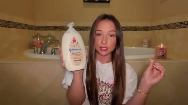 @emilylulamay reviewing Johnson's Skin Nourish Moisturizing Lotion at 02:46 in a YouTube Shorts video