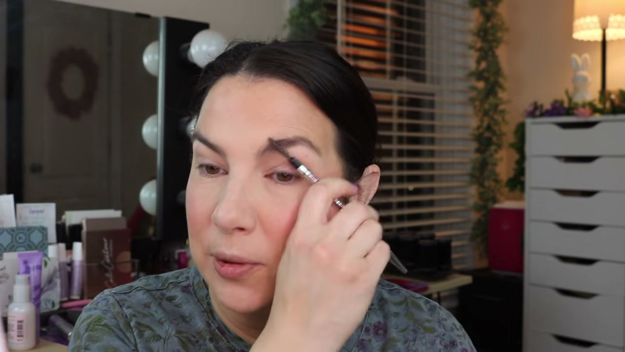 @emilynoel83 reviewing Benefit Cosmetics Precisely My Brow Pencil at 14:33 in a YouTube Shorts video