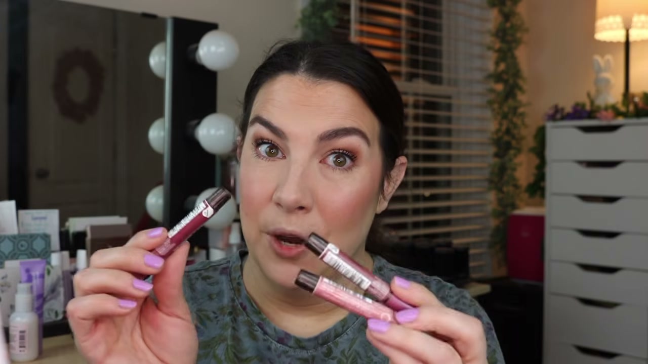 @emilynoel83 reviewing Burt's Bees Lip Shimmer at 26:09 in a YouTube Shorts video