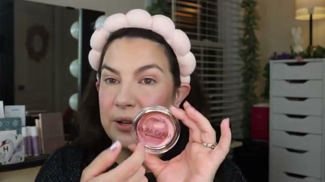@emilynoel83 reviewing Catrice Aura Glam Balm Highlighter at 18:49 in a YouTube Shorts video