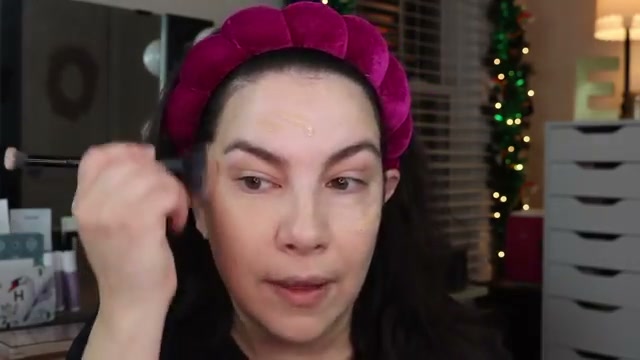 @emilynoel83 reviewing Catrice HD Liquid Coverage Foundation at 02:58 in a YouTube Shorts video