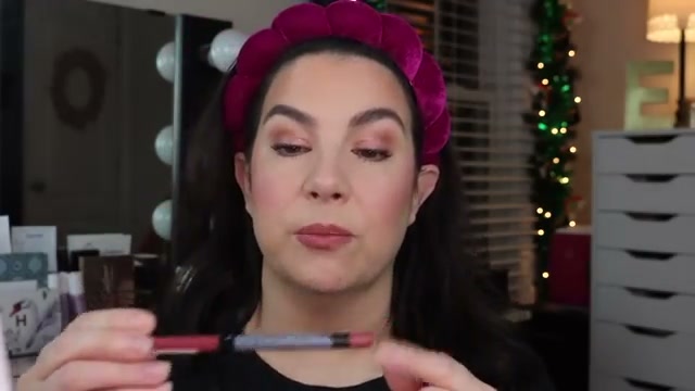 @emilynoel83 reviewing Catrice Plumping Lip Liner at 09:45 in a YouTube Shorts video