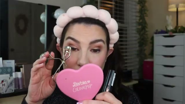 @emilynoel83 reviewing Catrice Tubing Stay in Place Volume Mascara at 21:21 in a YouTube Shorts video