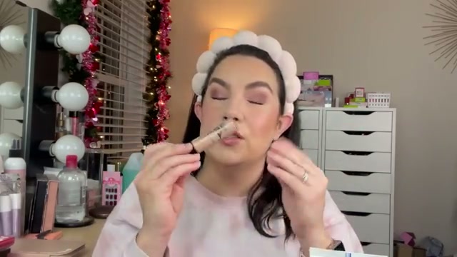 @emilynoel83 reviewing Dermablend Cover Care Concealer at 08:40 in a YouTube Shorts video