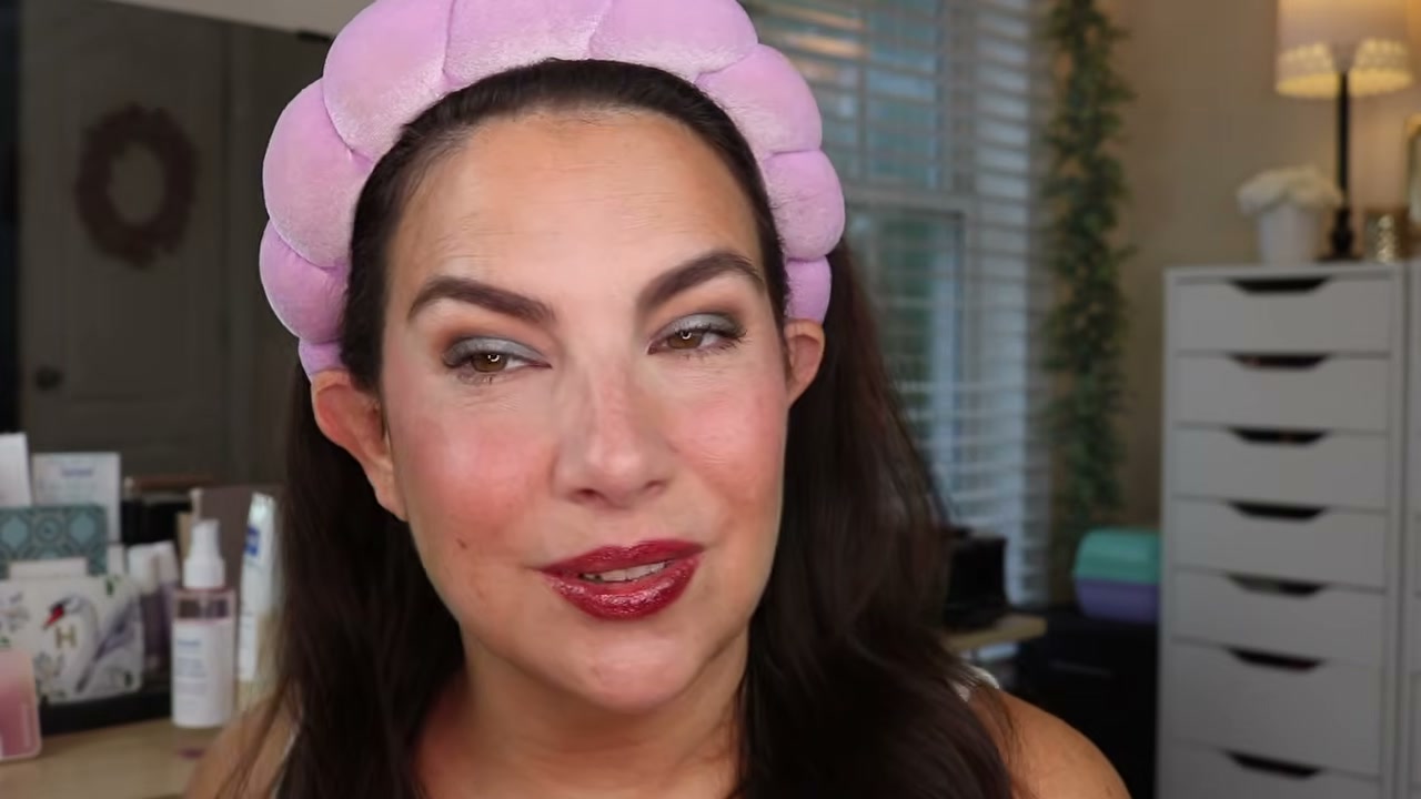 @emilynoel83 reviewing e.l.f. Cosmetics Glow Reviver Glimmer Lip Oil at 20:19 in a YouTube Shorts video