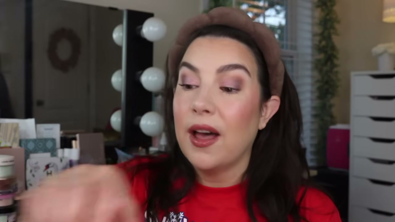 @emilynoel83 reviewing e.l.f. Cosmetics Halo Glow Powder Filter at 09:08 in a YouTube Shorts video
