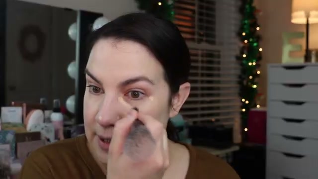 @emilynoel83 reviewing e.l.f. Cosmetics Hydrating Camo Concealer at 05:55 in a YouTube Shorts video