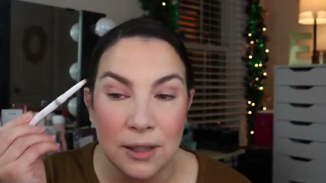 @emilynoel83 reviewing e.l.f. Cosmetics Instant Lift Brow Pencil at 14:03 in a YouTube Shorts video