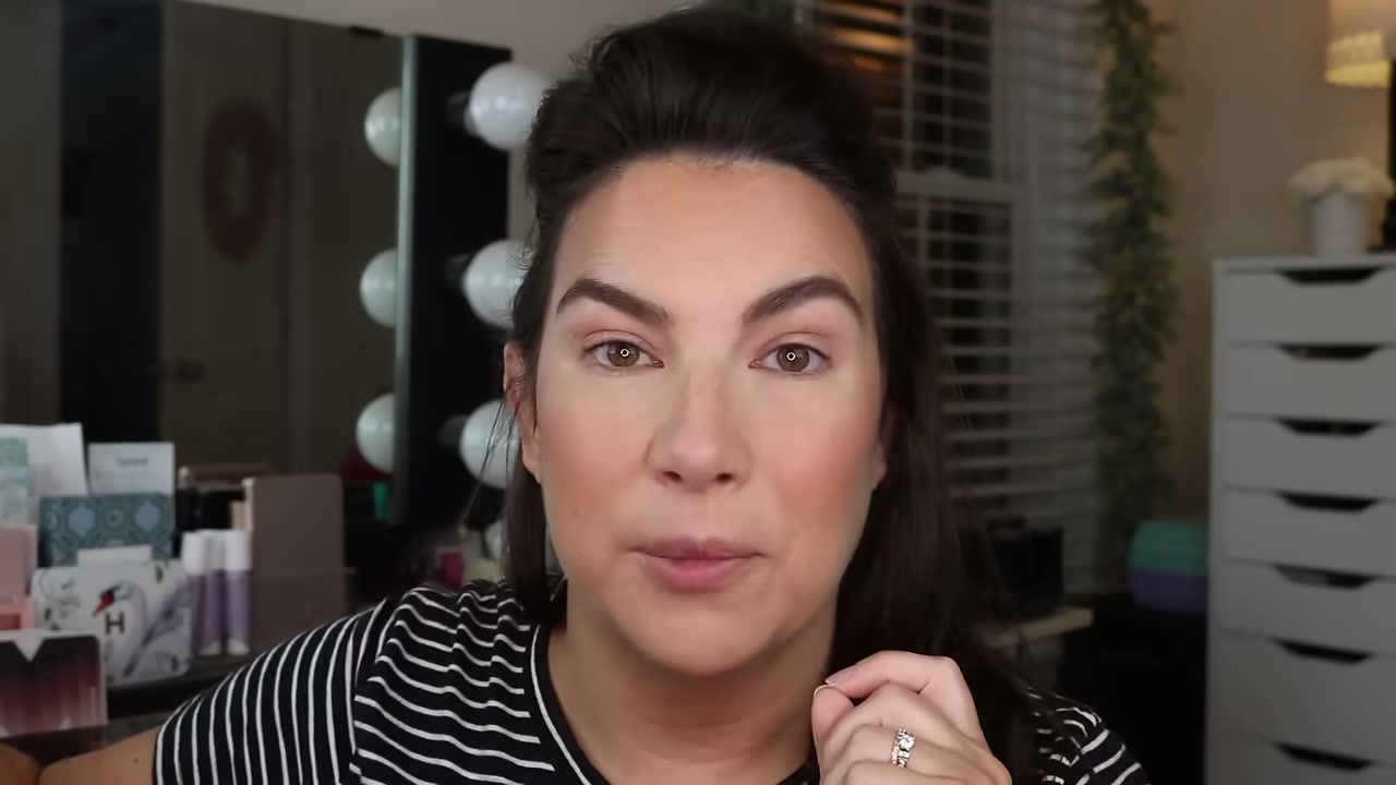 @emilynoel83 reviewing e.l.f. Cosmetics Power Grip Primer at 01:11 in a YouTube Shorts video