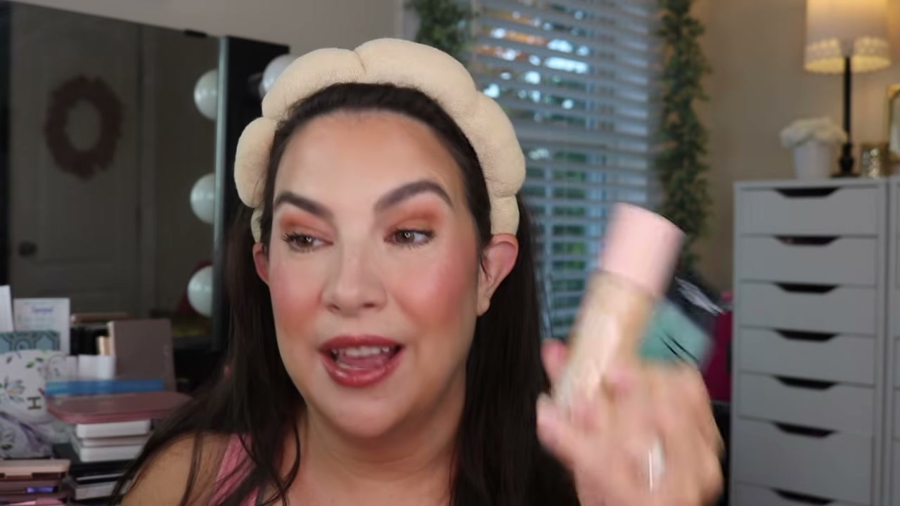 @emilynoel83 reviewing e.l.f. Cosmetics Power Grip Primer at 04:04 in a YouTube Shorts video