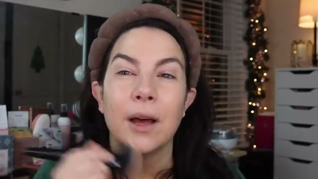 @emilynoel83 reviewing e.l.f. Cosmetics Smooth Swipe Foundation Brush at 02:03 in a YouTube Shorts video