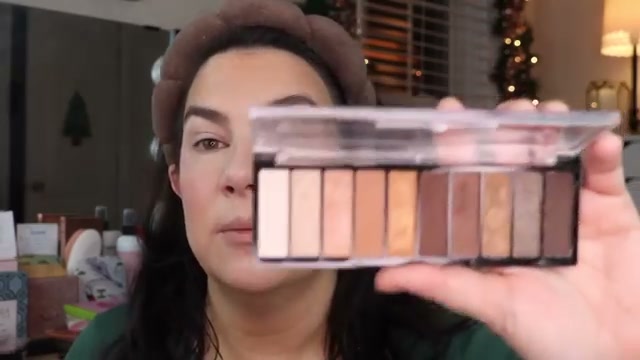 @emilynoel83 reviewing Hard Candy Going Nude Never Looking Back Eye Palette at 10:18 in a YouTube Shorts video