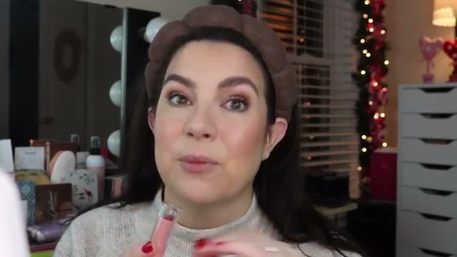 @emilynoel83 reviewing IONI Cosmetics Shea Butter Hydrating Buildable Lipstick at 20:37 in a YouTube Shorts video