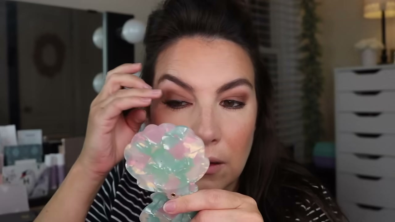 @emilynoel83 reviewing KISS The New Natural False Lashes at 12:23 in a YouTube Shorts video