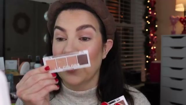 @emilynoel83 reviewing L.A. Colors Eyeshadow Quad at 13:08 in a YouTube Shorts video