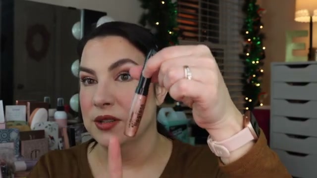 @emilynoel83 reviewing L.A. Colors Moisturizing Lip Gloss at 24:26 in a YouTube Shorts video