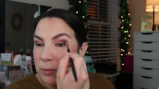 @emilynoel83 reviewing L.A. Colors Nude Eyeshadow Palette at 20:15 in a YouTube Shorts video