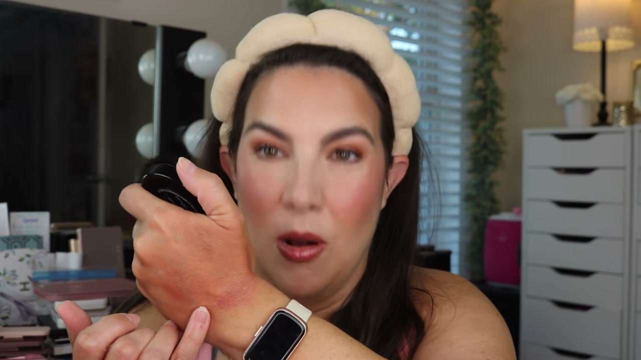 @emilynoel83 reviewing Laura Geller Baked Blush N Bronze at 09:02 in a YouTube Shorts video