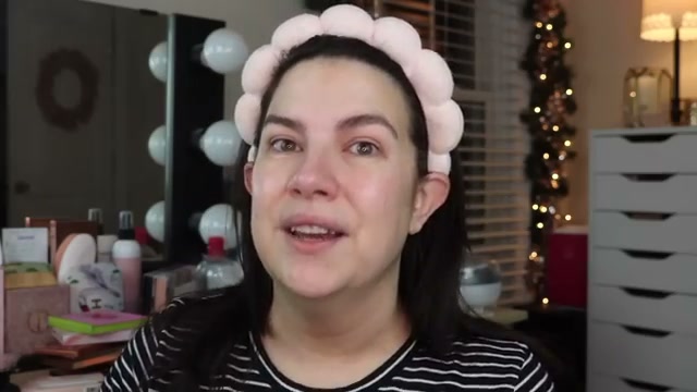 @emilynoel83 reviewing Laura Geller RSVP Ready Big Night Out Full Face Palette at 02:04 in a YouTube Shorts video