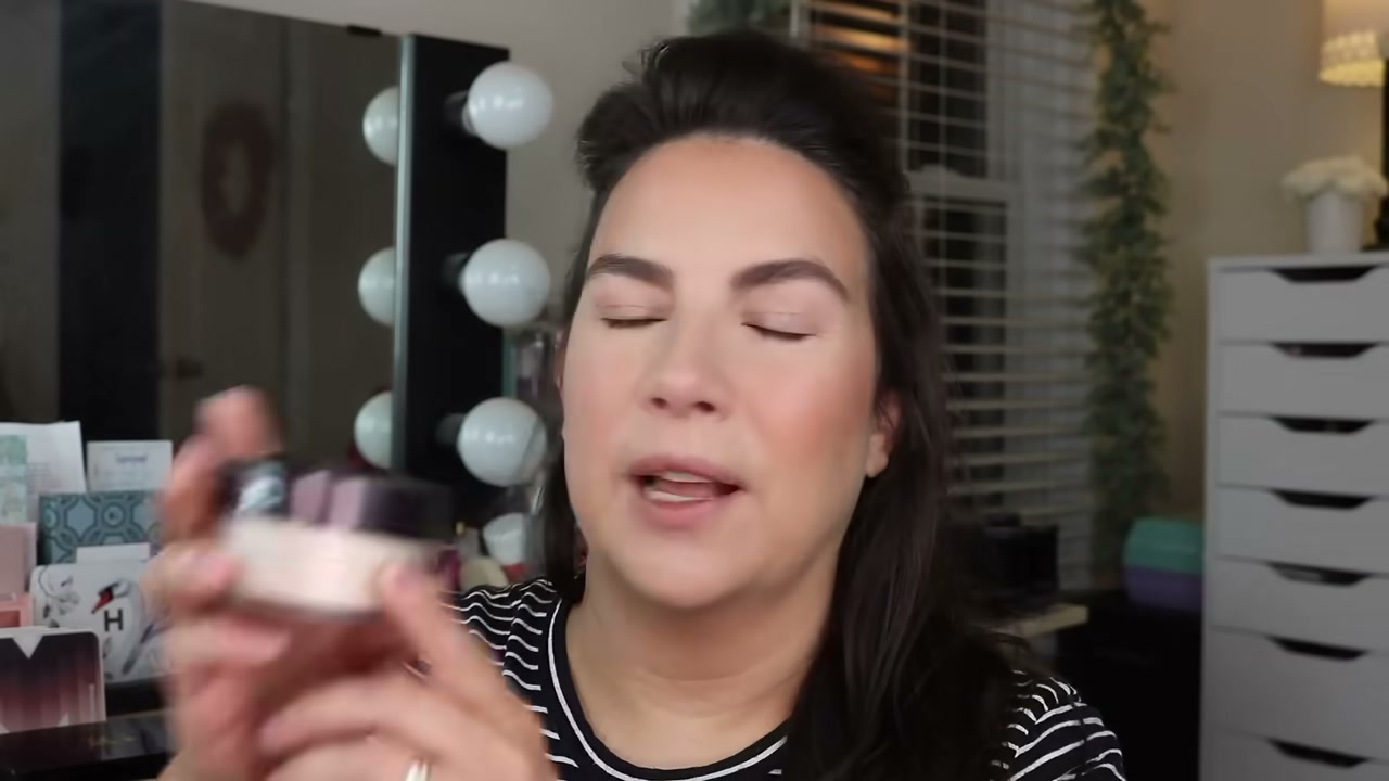 @emilynoel83 reviewing Laura Mercier Translucent Loose Setting Powder at 01:24 in a YouTube Shorts video