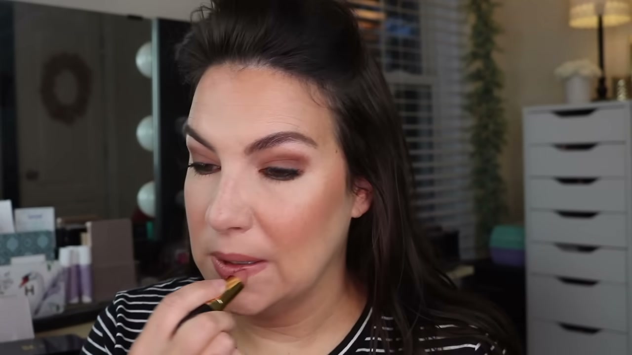 @emilynoel83 reviewing Lawless Forget the Filler Lip Plumper at 14:11 in a YouTube Shorts video
