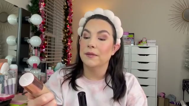 @emilynoel83 reviewing Lawless Forget the Filler Skin Plumping Line Smoothing Foundation at 00:59 in a YouTube Shorts video