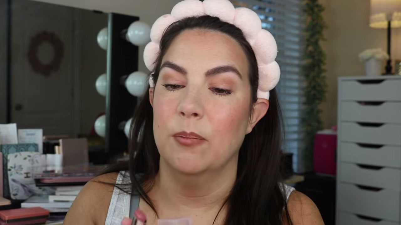 @emilynoel83 reviewing Maybelline Lifter Glaze at 17:40 in a YouTube Shorts video