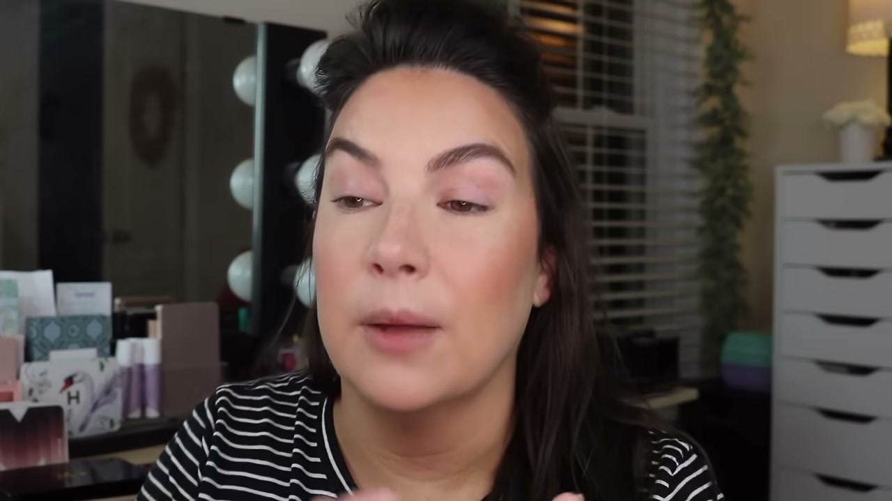 @emilynoel83 reviewing Milani Eyeshadow Primer at 02:23 in a YouTube Shorts video