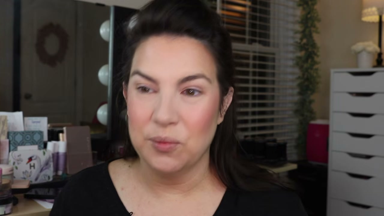 @emilynoel83 reviewing Milani Make It Last Moisture Boost Setting Spray at 11:27 in a YouTube Shorts video