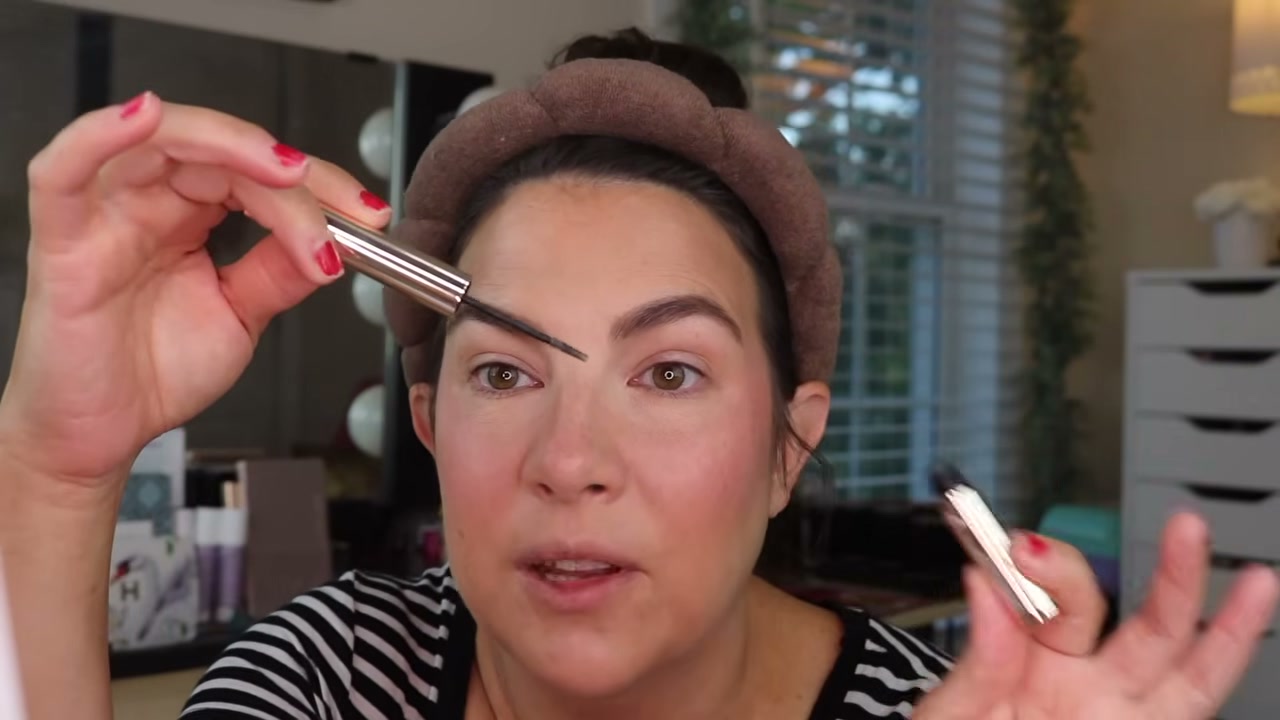 @emilynoel83 reviewing Morphe Micro Manager Gripping Brow Gel at 16:17 in a YouTube Shorts video