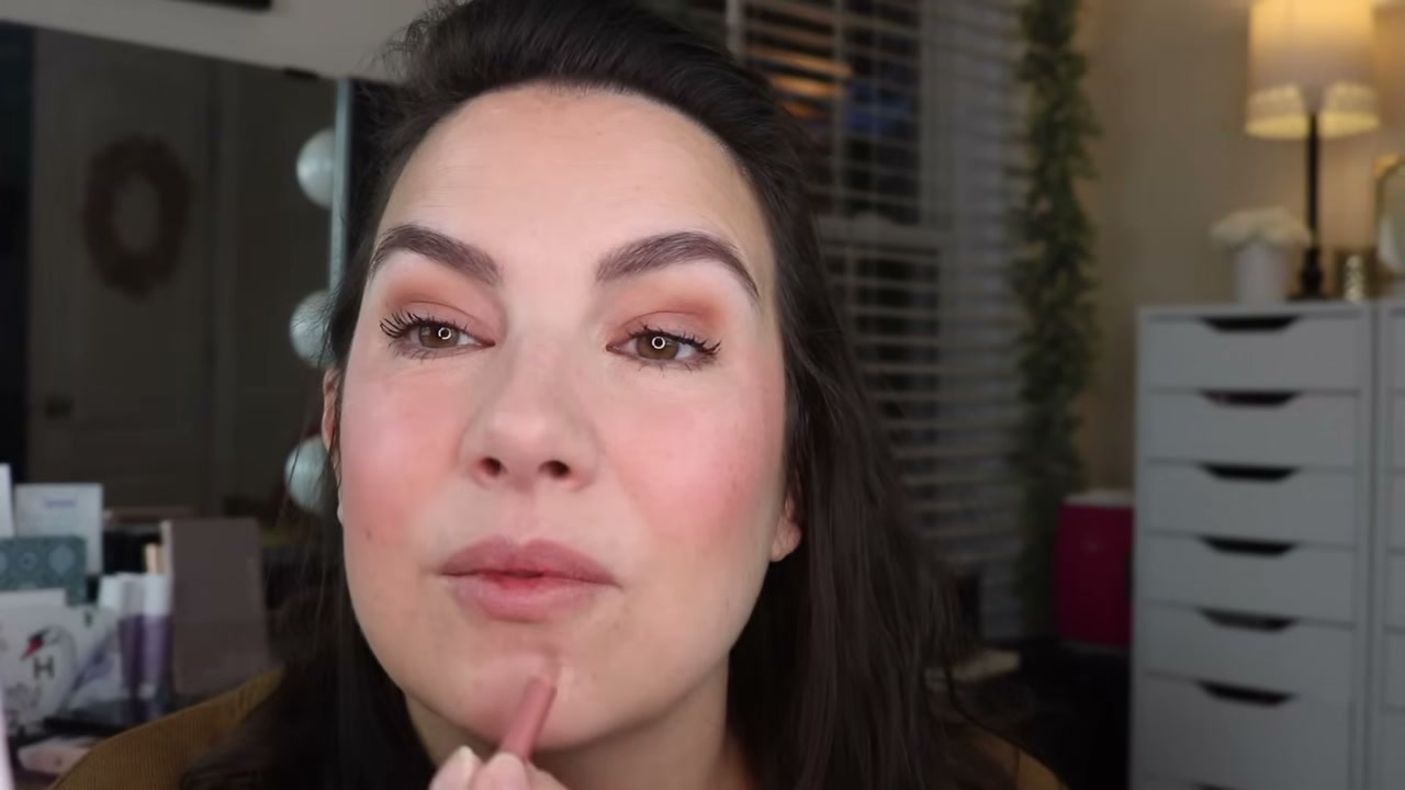 @emilynoel83 reviewing Nude by Nature Defining Lip Pencil at 15:22 in a YouTube Shorts video