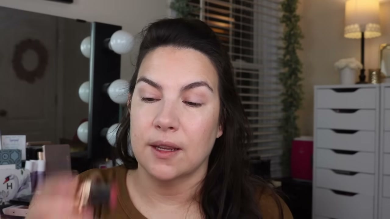 @emilynoel83 reviewing Nude by Nature Hydra Stick Lip & Cheek at 09:02 in a YouTube Shorts video