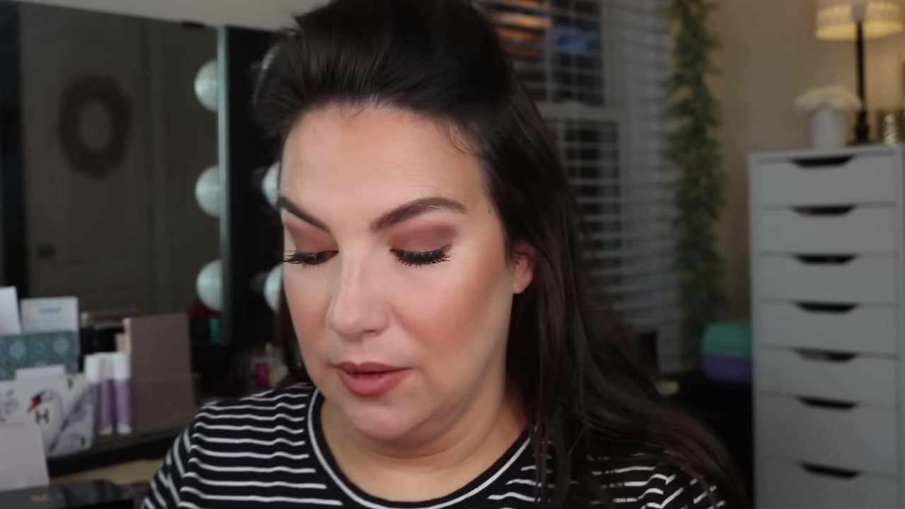 @emilynoel83 reviewing Revlon Super Lustrous Lipstick at 14:03 in a YouTube Shorts video