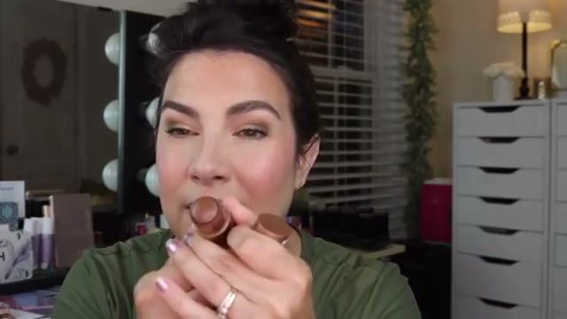@emilynoel83 reviewing Rimmel Multi Tasker 3 in 1 Bronzing Stick at 13:39 in a YouTube Shorts video