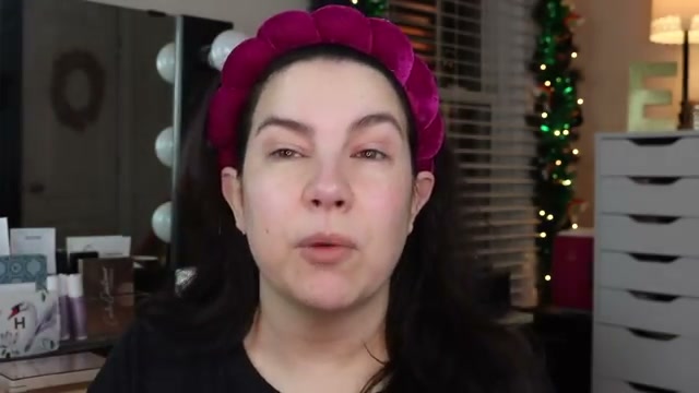 @emilynoel83 reviewing Rimmel Multitasker Primer at 01:32 in a YouTube Shorts video