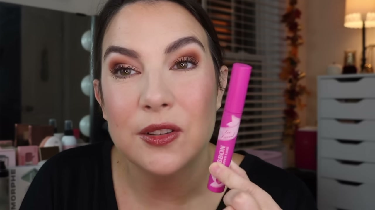 @emilynoel83 reviewing Too Faced Ribbon Wrapped Tubing Mascara at 10:47 in a YouTube Shorts video