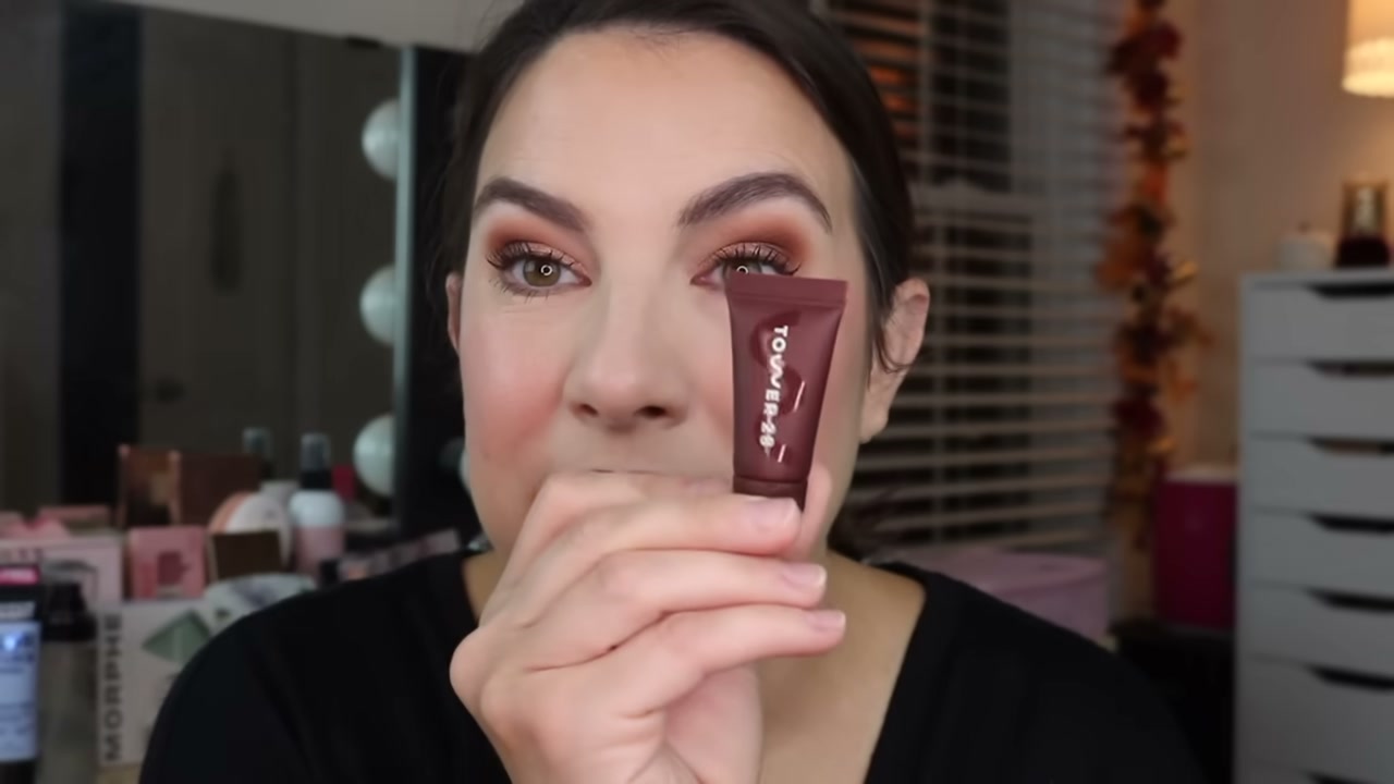@emilynoel83 reviewing Tower 28 Beauty Lip Softie at 13:06 in a YouTube Shorts video