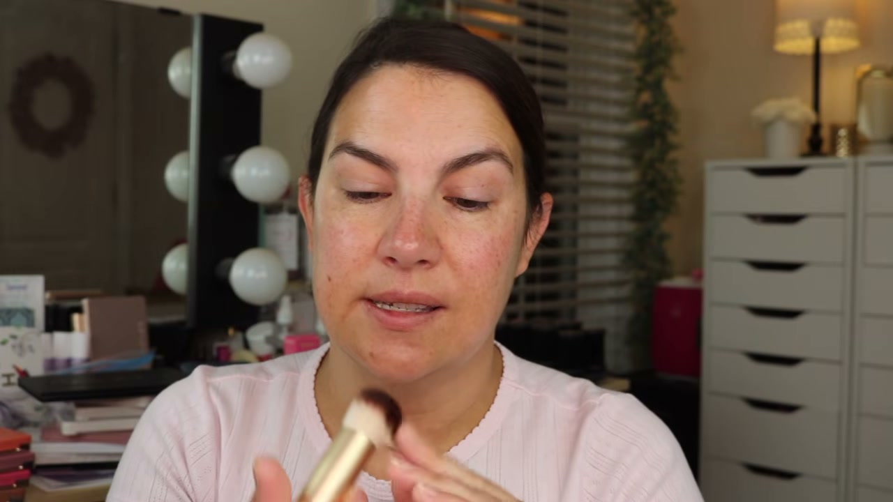 @emilynoel83 reviewing Walmart Buffing Foundation Brush at 01:18 in a YouTube Shorts video