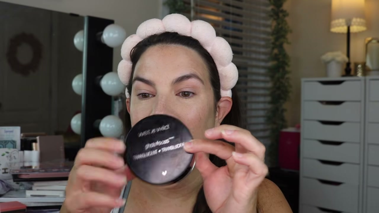 @emilynoel83 reviewing Wet n Wild Photo Focus Translucent Loose Powder at 06:23 in a YouTube Shorts video