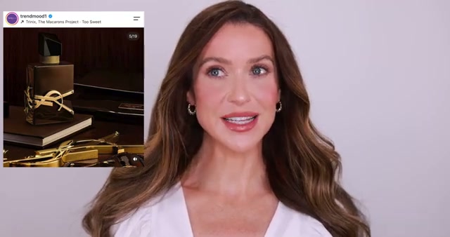@erinnicoletv reviewing Yves Saint Laurent Libre Santal Couture at 06:06 in a YouTube Shorts video