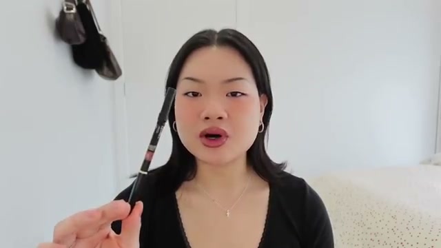 @estherdaze reviewing CHANEL Le Crayon Lèvres Precision Lip-Defining Pencil at 08:03 in a YouTube Shorts video