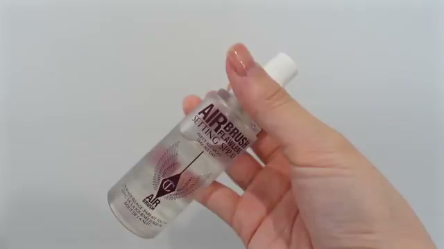 @estherdaze reviewing Charlotte Tilbury Airbrush Flawless Setting Spray at 09:29 in a YouTube Shorts video