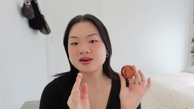 @estherdaze reviewing Danessa Myricks Beauty Yummy Skin Blurring Balm Powder at 04:43 in a YouTube Shorts video