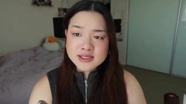 @estherdaze reviewing Fluff Lip Oil at 07:42 in a YouTube Shorts video