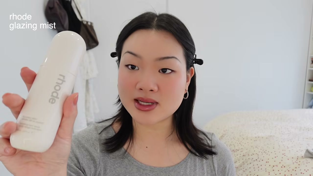 @estherdaze reviewing Rhode Skin Glazing Mist at 07:01 in a YouTube Shorts video