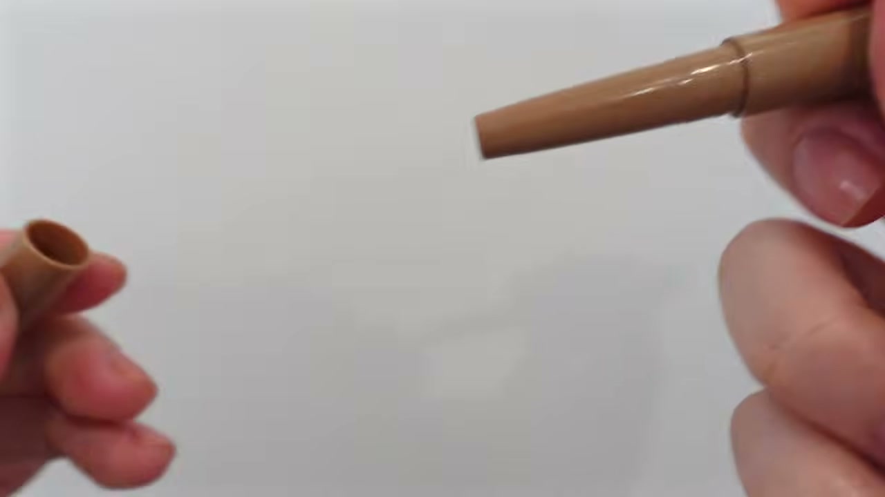 @estherdaze reviewing Rhode Skin Peptide Lip Shape Contouring Lip Shaper at 13:11 in a YouTube Shorts video