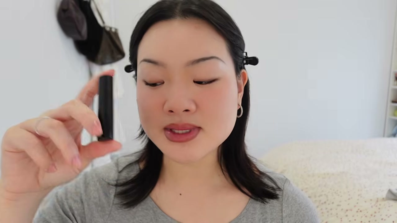 @estherdaze reviewing Rhode Skin Peptide Lip Tint at 06:20 in a YouTube Shorts video
