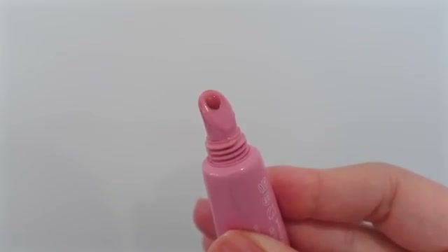 @estherdaze reviewing Rhode Skin Peptide Lip Tint at 09:02 in a YouTube Shorts video